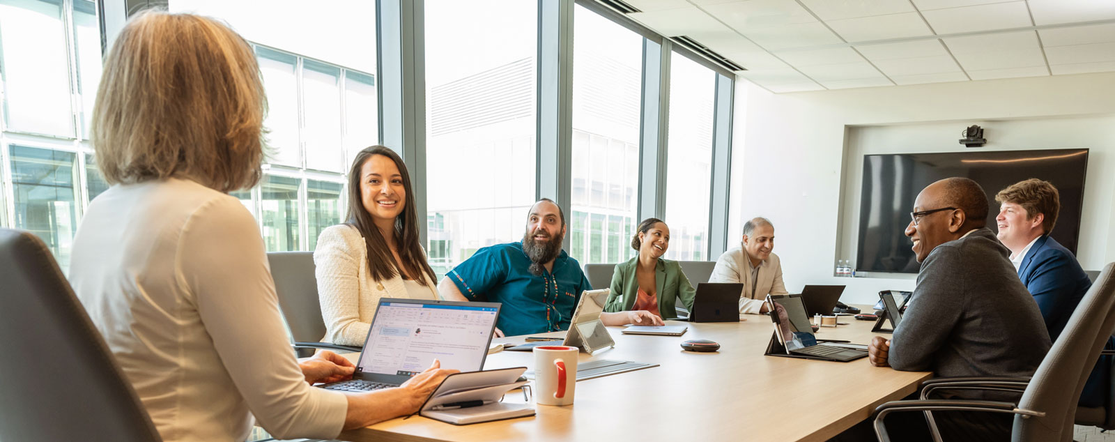 API staff in meeting room